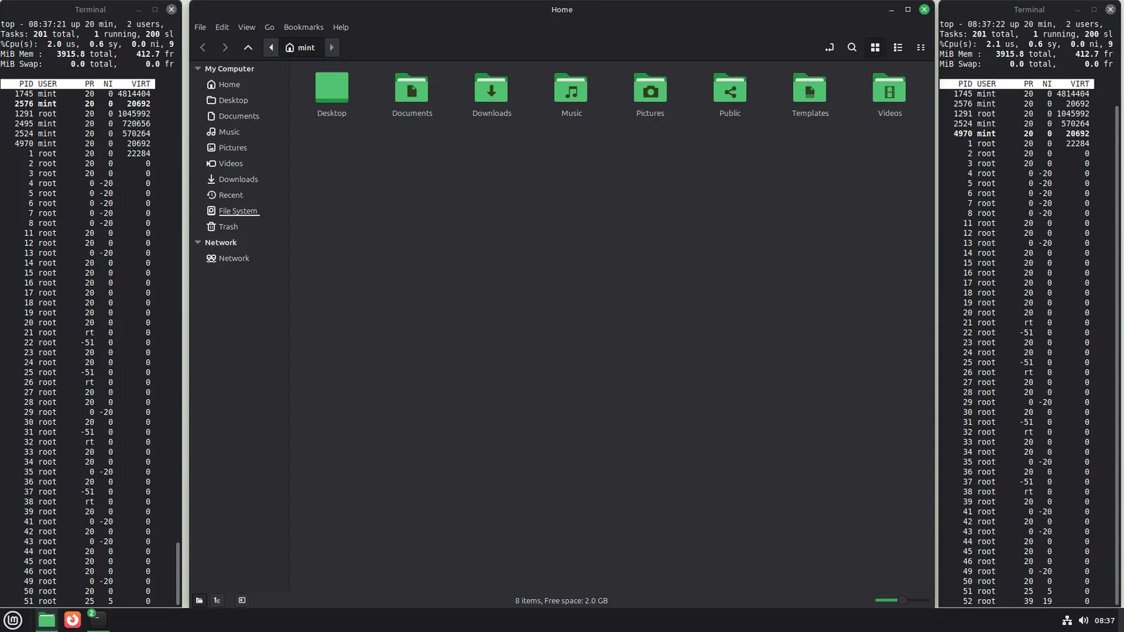 Three tiled windows in the ratio one to four to one: a narrow terminal on the left, a wide file manager in the middle and a narrow terminal on the right